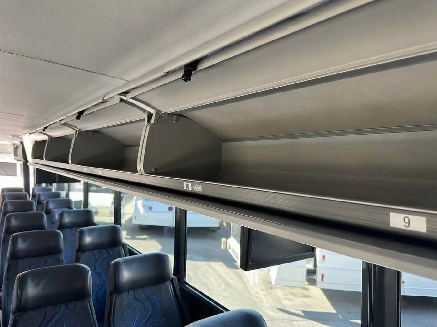 wauwatosa 25 passenger minibus overhead storage