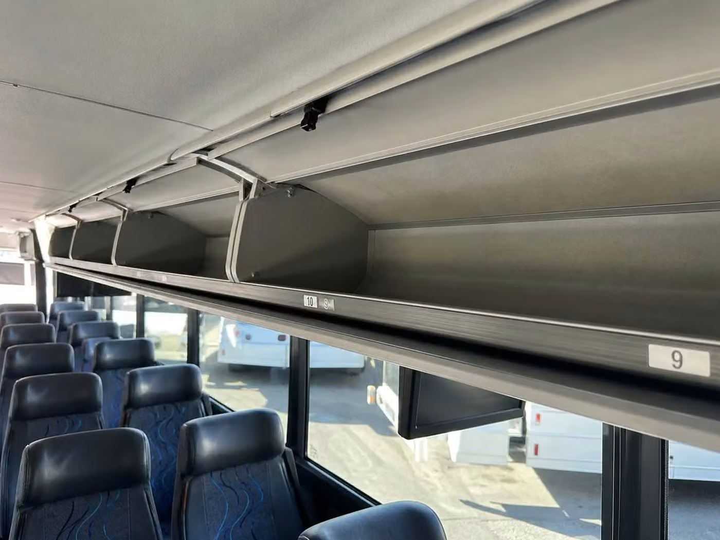 wauwatosa 28 passenger minibus overhead storage